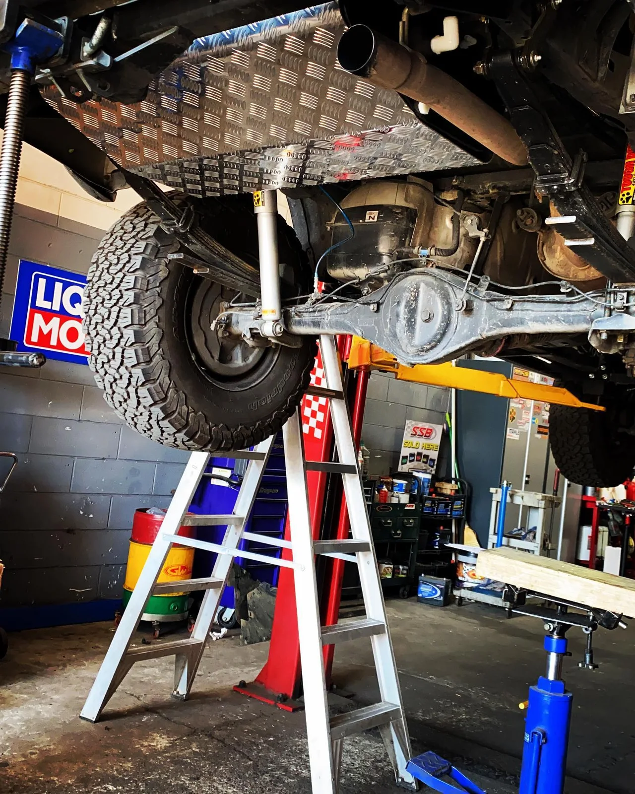 Underbody water tank and bash plate installation